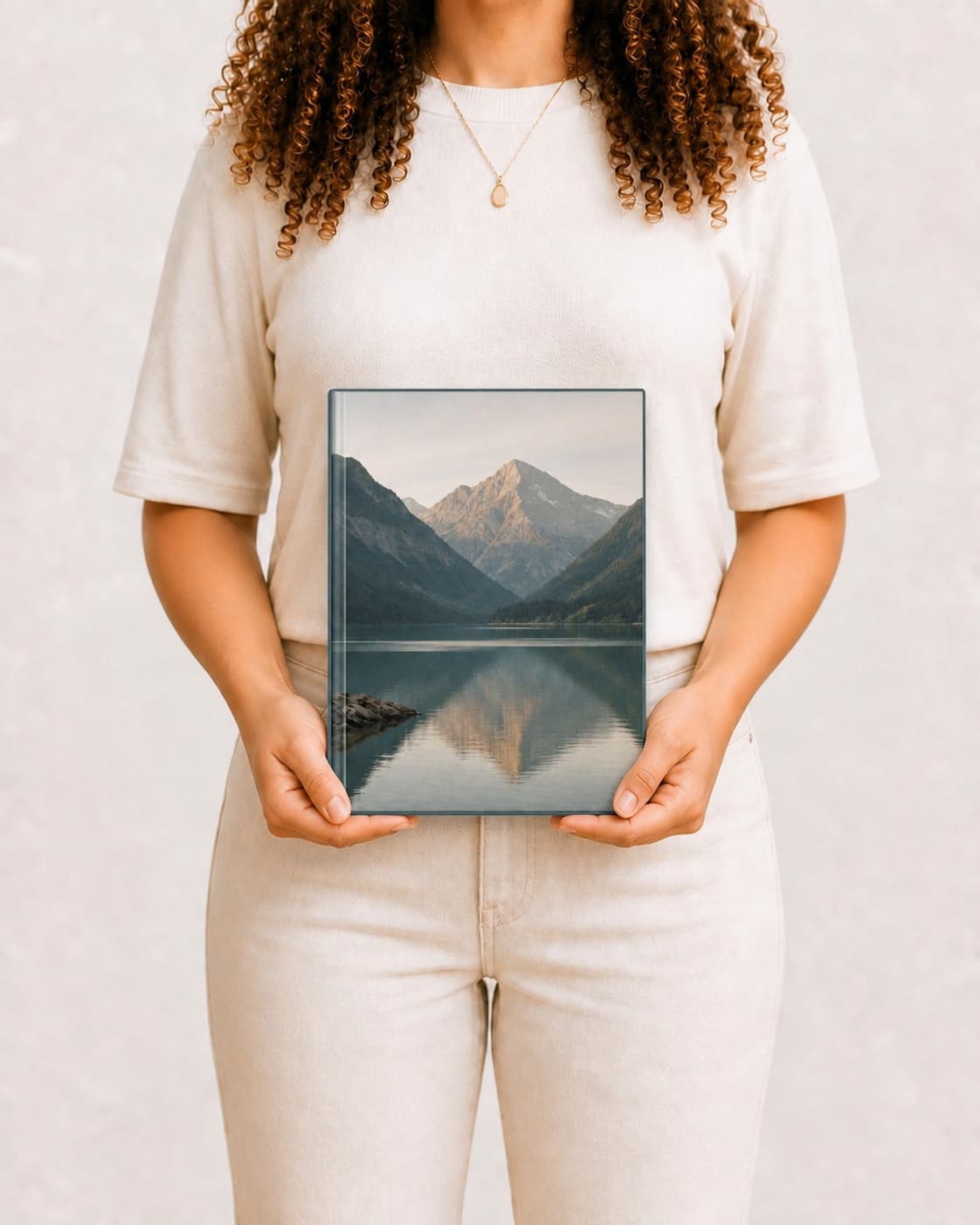 Álbum Grand, 30 × 40 cm, nas mãos